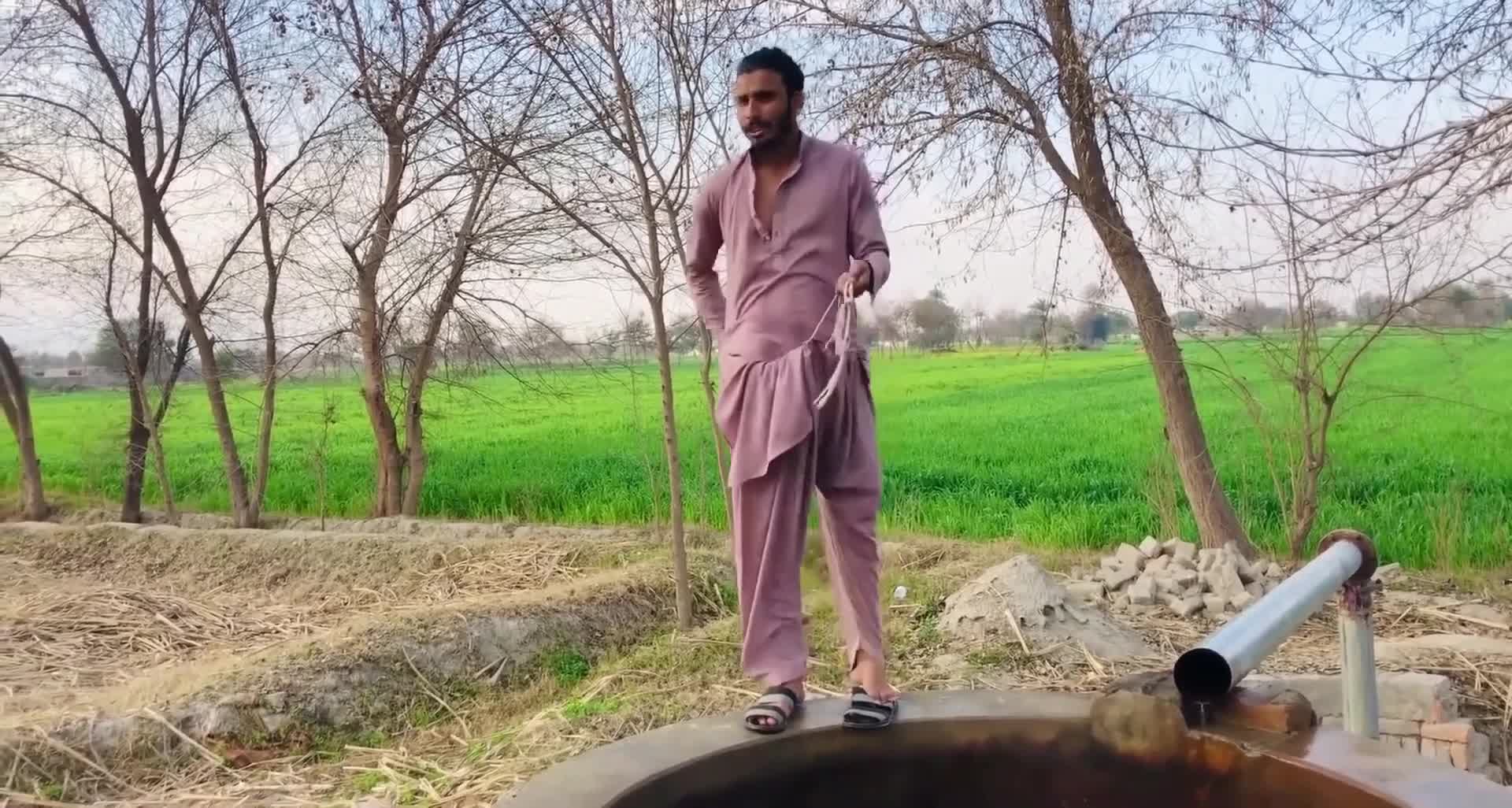 Sexy Pakistani village guy showing his dick after bathing in the tubewell! Hot guy! (preview)